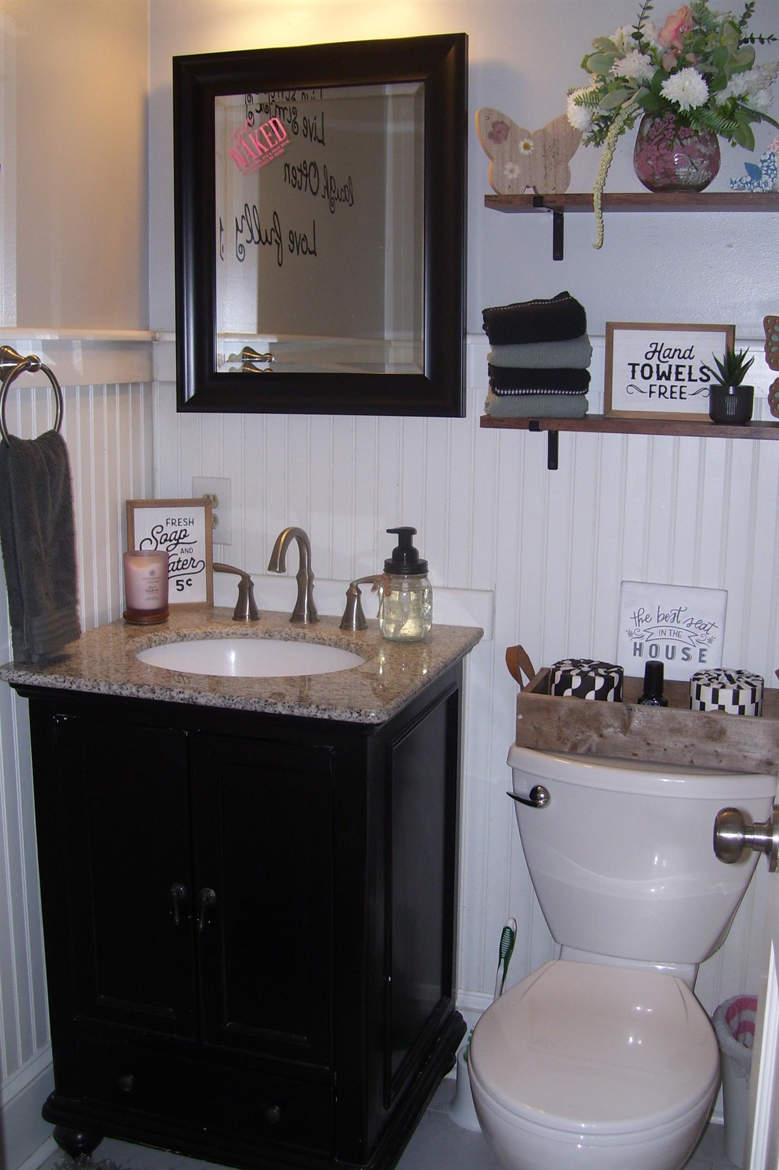 743 Comertown Road Shenandoah, VA 22849 - Photo 16 of 28 a bathroom with a toilet a sink and mirror