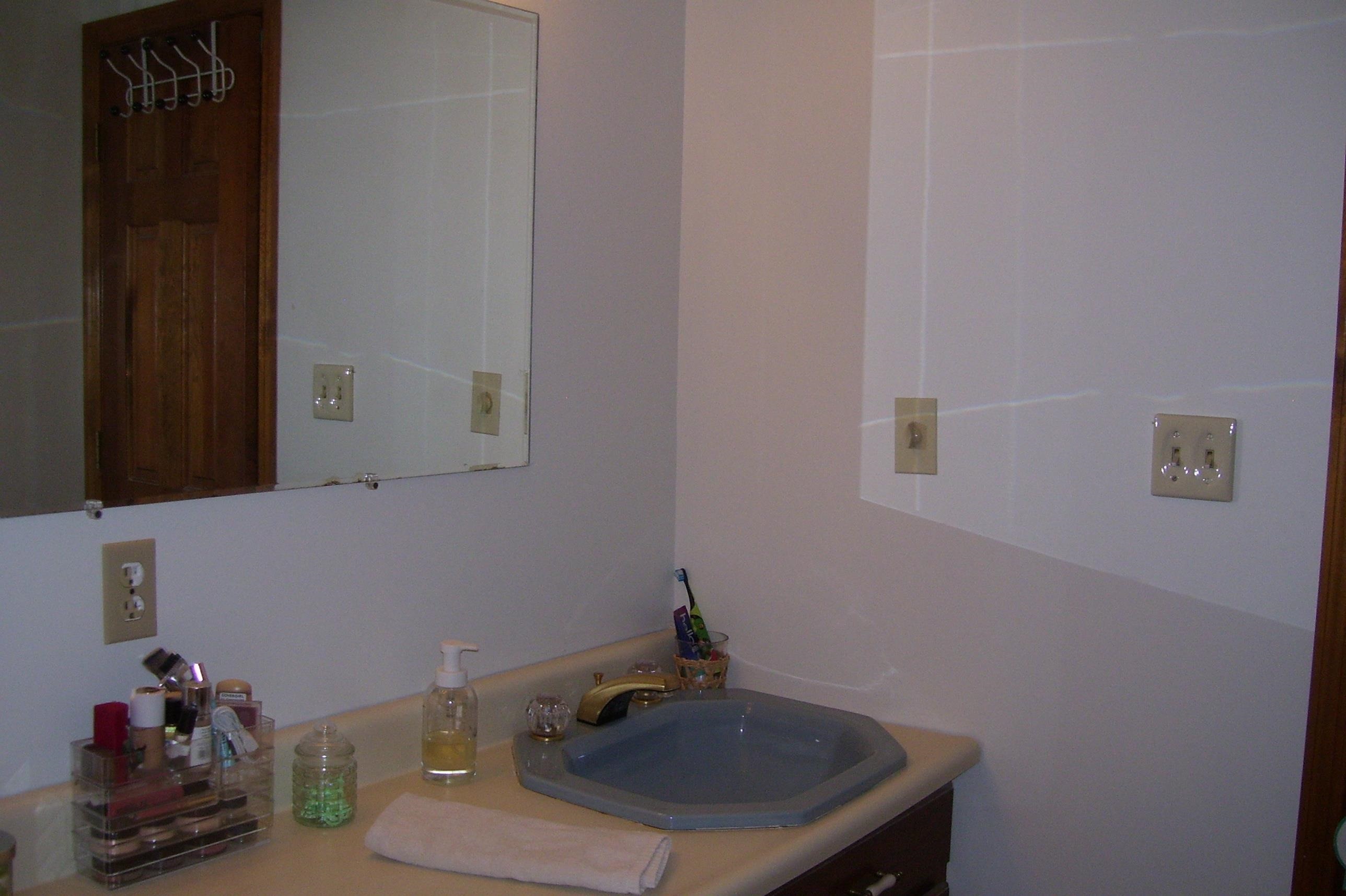 743 Comertown Road Shenandoah, VA 22849 - Photo 19 of 28 a bathroom with a sink and a mirror