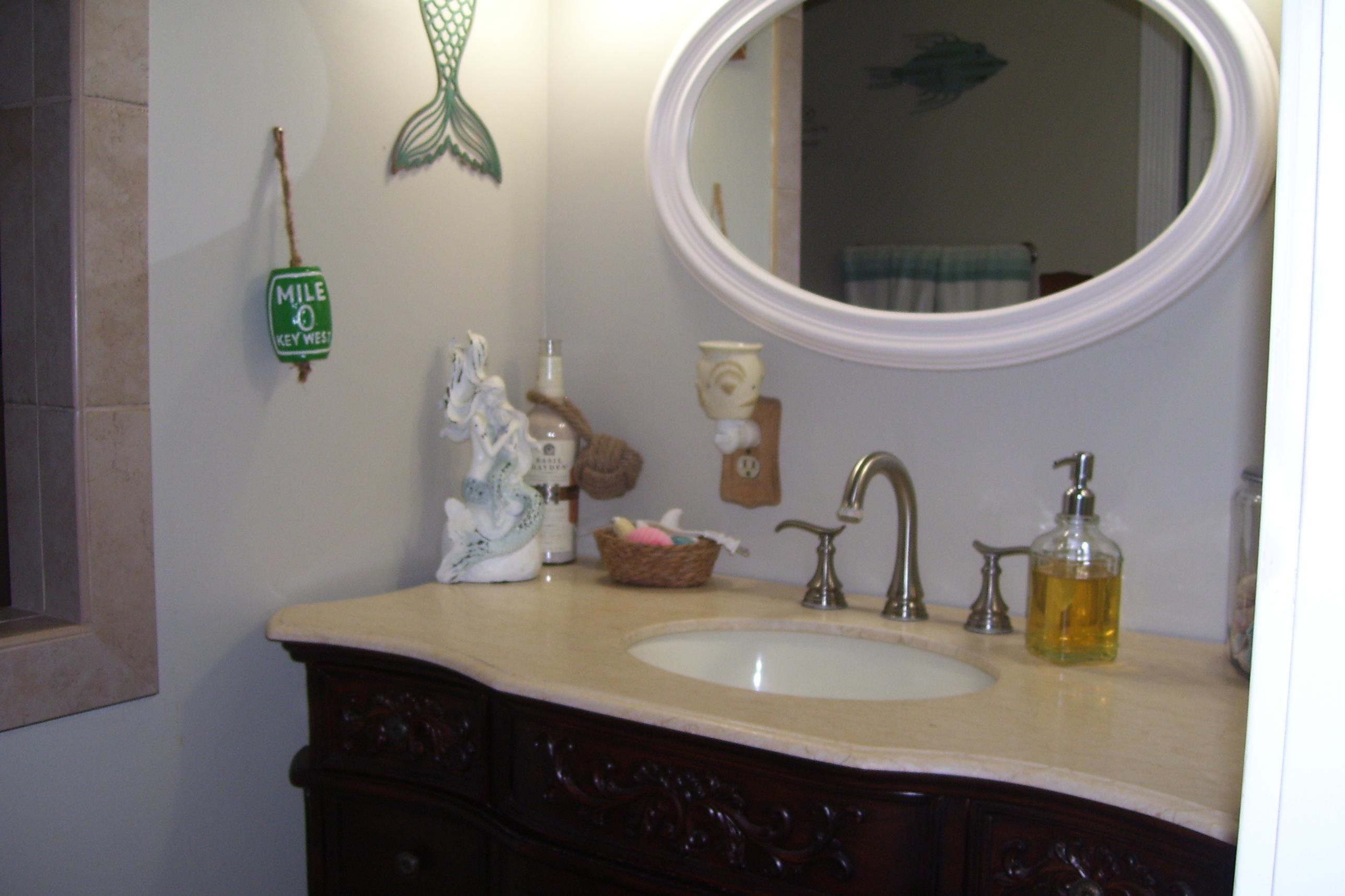 743 Comertown Road Shenandoah, VA 22849 - Photo 20 of 28 a bathroom with a sink and a mirror