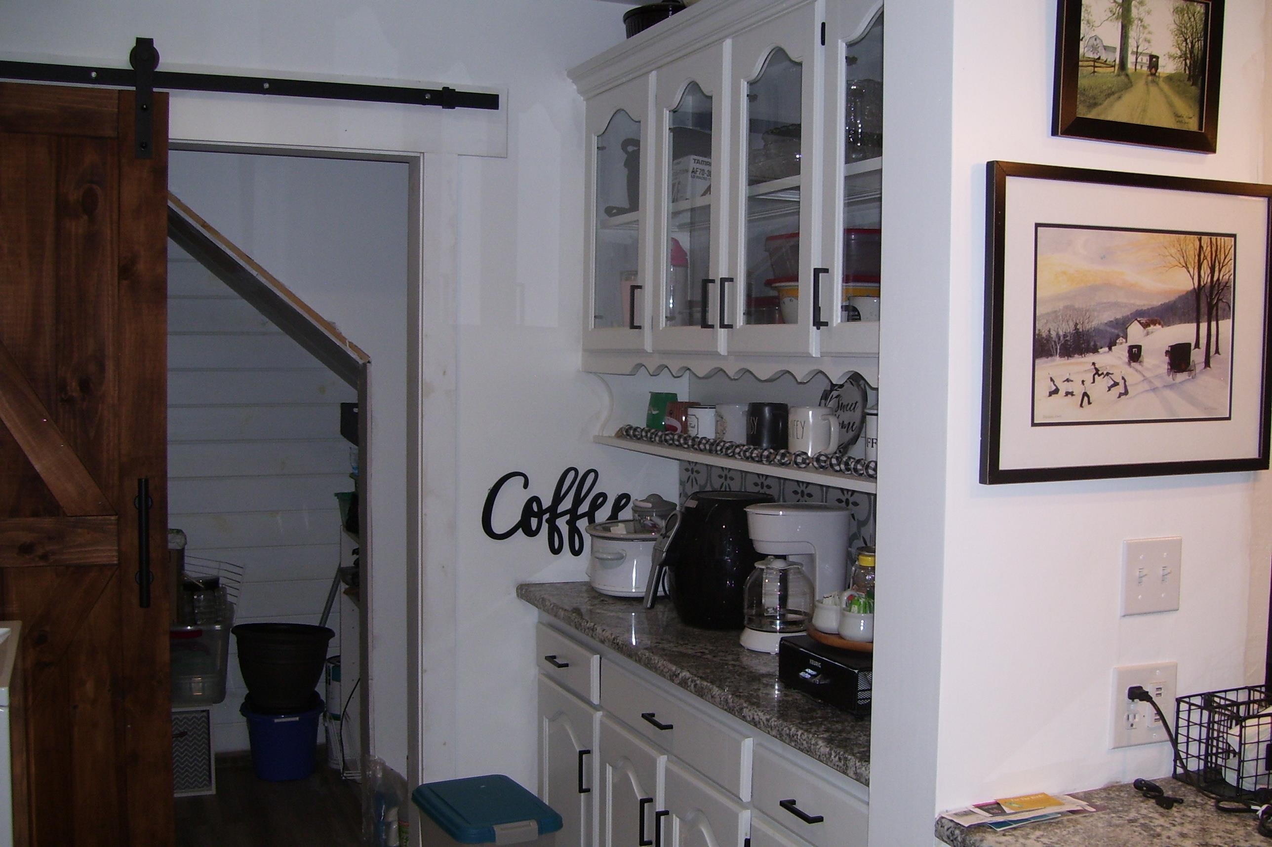 743 Comertown Road Shenandoah, VA 22849 - Photo 25 of 28 a kitchen with a refrigerator and cabinets
