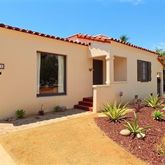 a front view of a house with a outdoor space