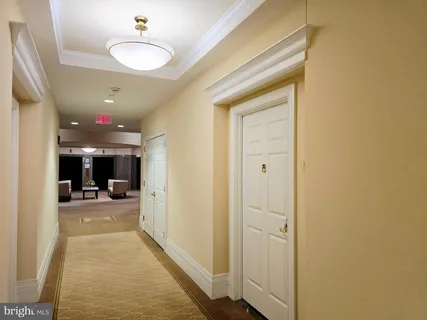 a stove top oven sitting inside of a kitchen