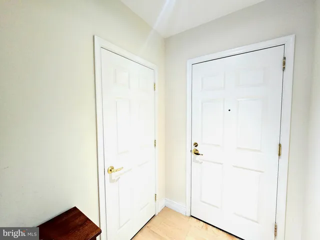 a kitchen with stainless steel appliances granite countertop a stove a microwave and cabinets