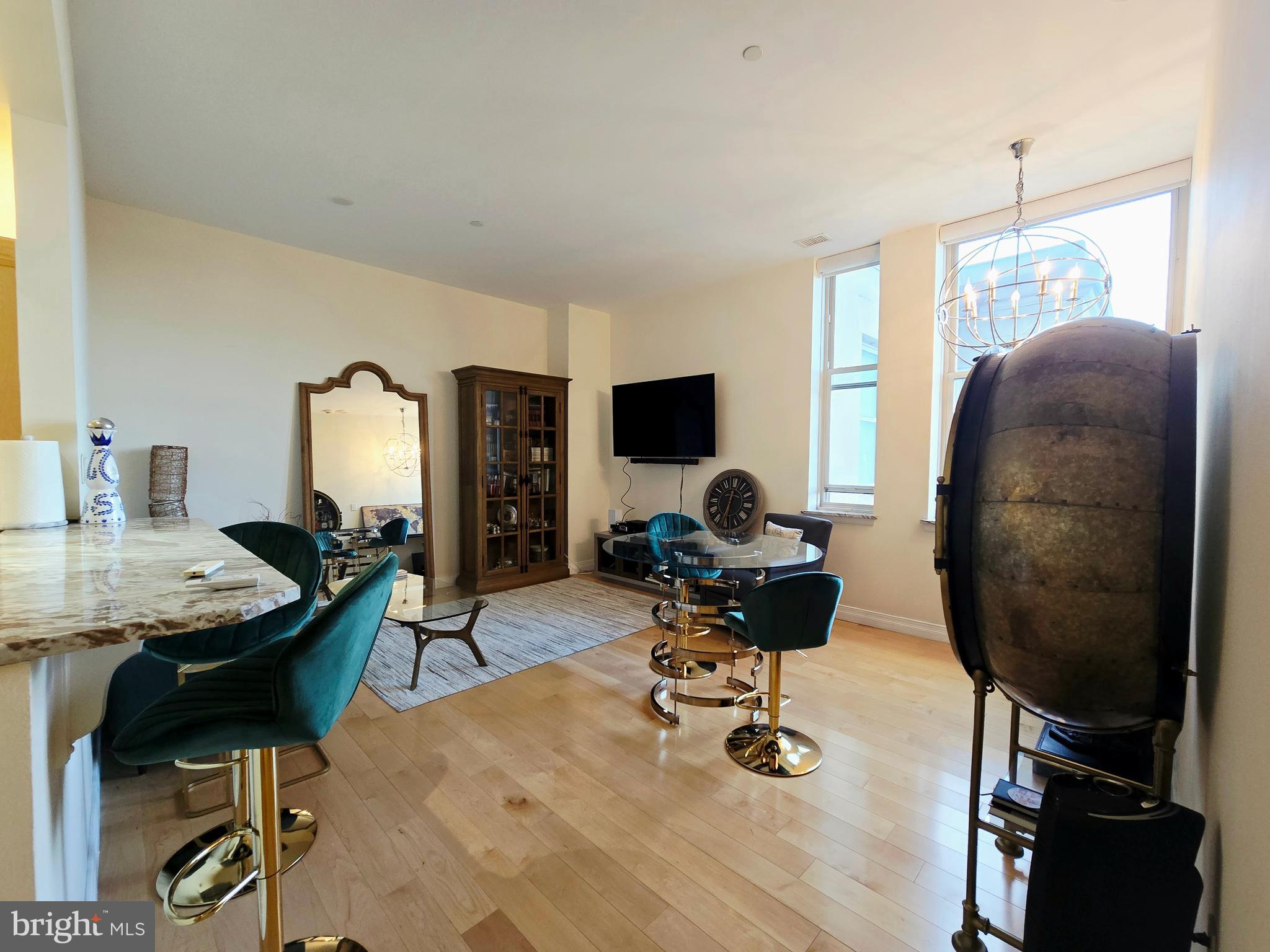 1600 Arch Street, Unit 1905 Philadelphia, PA 19103 - Photo 24 of 92 a view of a workspace with furniture and a mirror