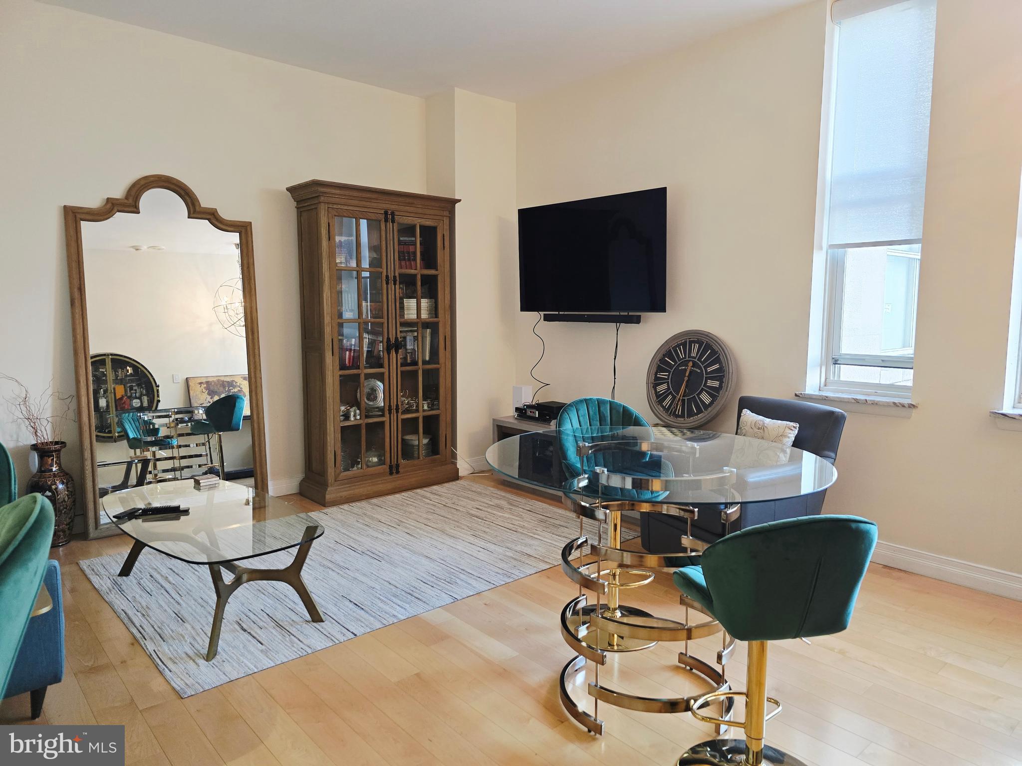 1600 Arch Street, Unit 1905 Philadelphia, PA 19103 - Photo 26 of 92 a living room with furniture and a flat screen tv