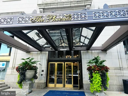 a view of a lobby with furniture and natural light