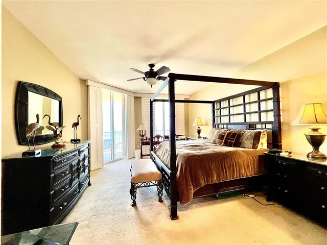 a spacious bathroom with a double vanity sink a mirror and a bathtub