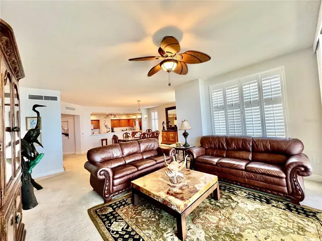 a kitchen with granite countertop a sink a counter space appliances and cabinets