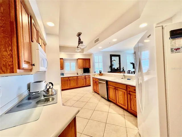 a large room with table and chairs