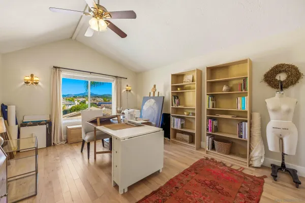 a patio with a table and chairs
