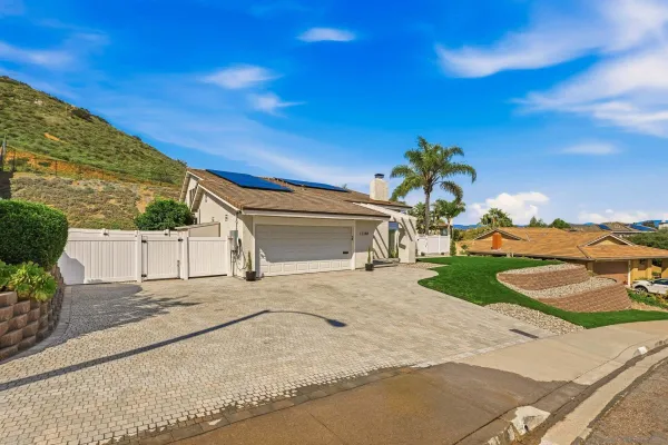 a view of an entryway with a floor to ceiling window