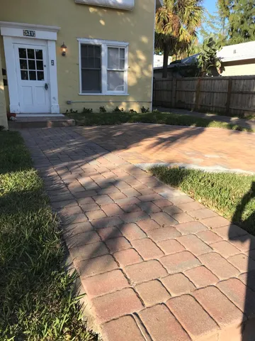 a view of a house with a snow on the ground