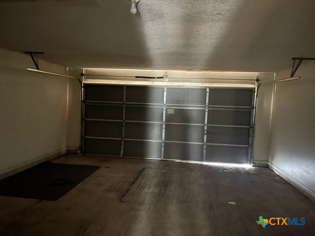 213 Blanket Drive Copperas Cove, TX 76522 - Photo 11 of 14 a view of a room with wooden floor and a window