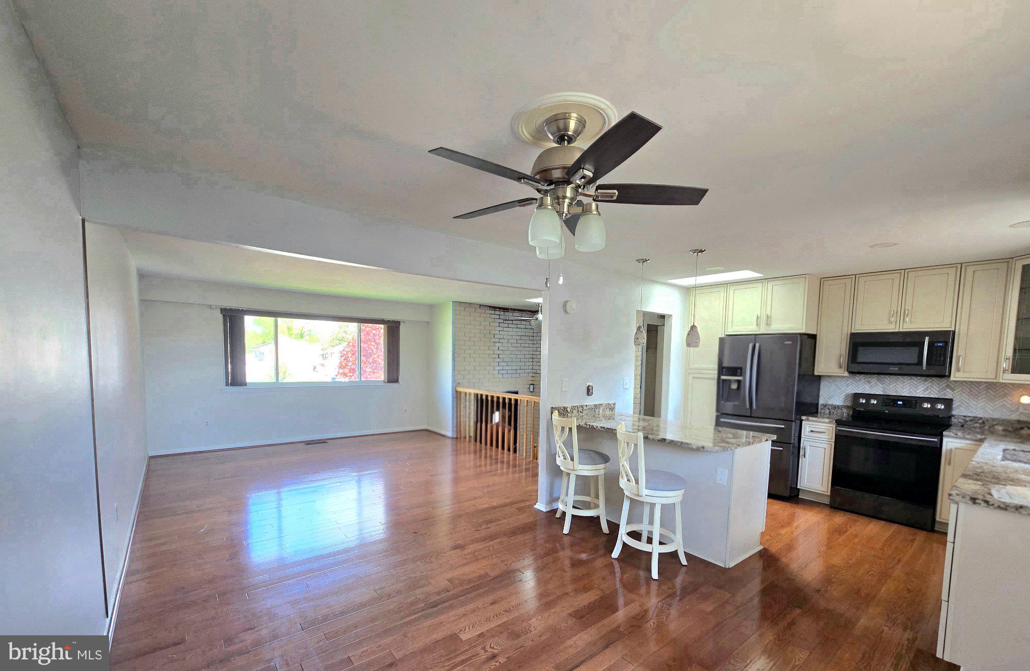 8819 Sonya Road Randallstown, MD 21133 - Photo 4 of 28 Bright, open kitchen with modern flair.