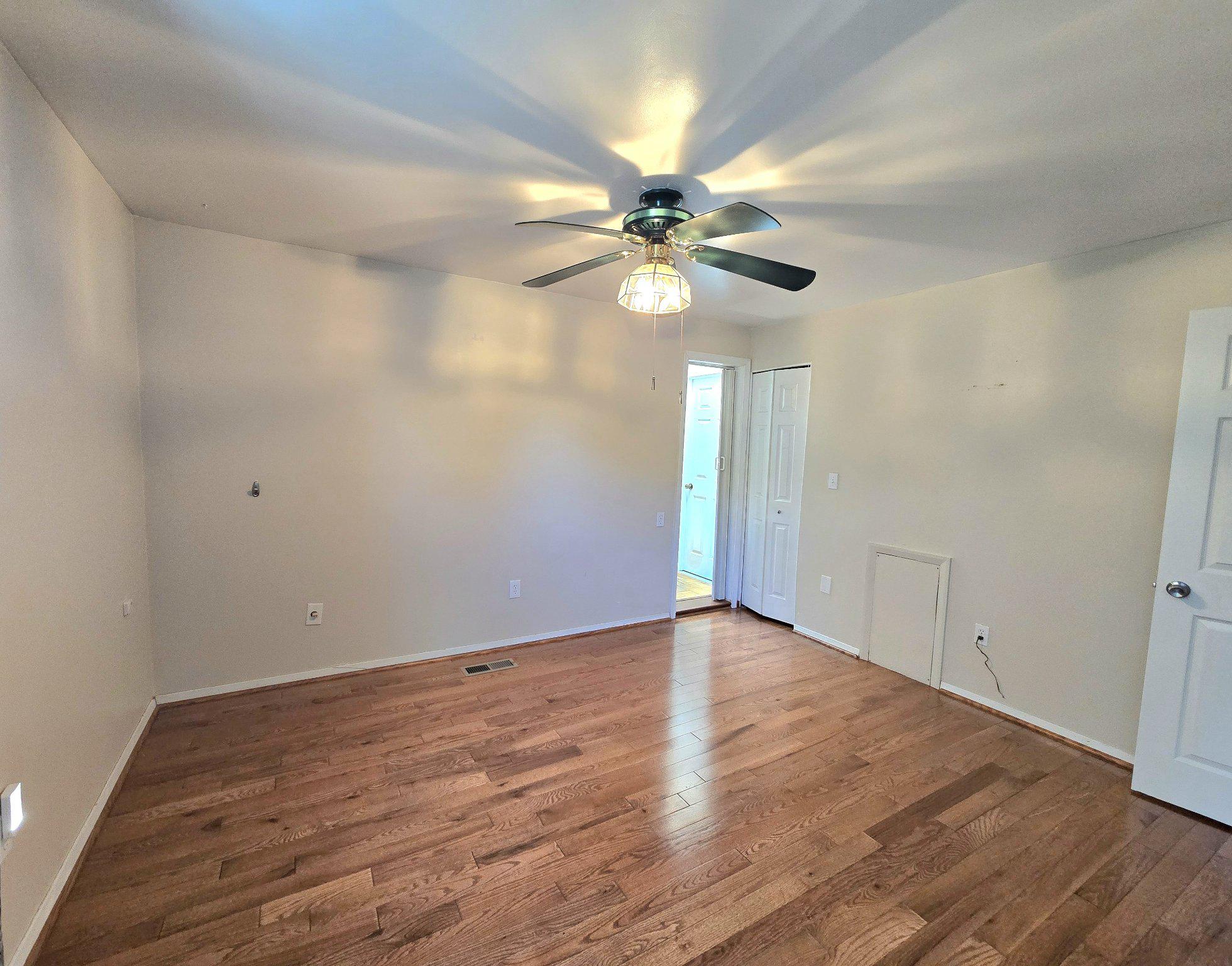 8819 Sonya Road Randallstown, MD 21133 - Photo 9 of 28 Primary Bedroom with hardwood floor