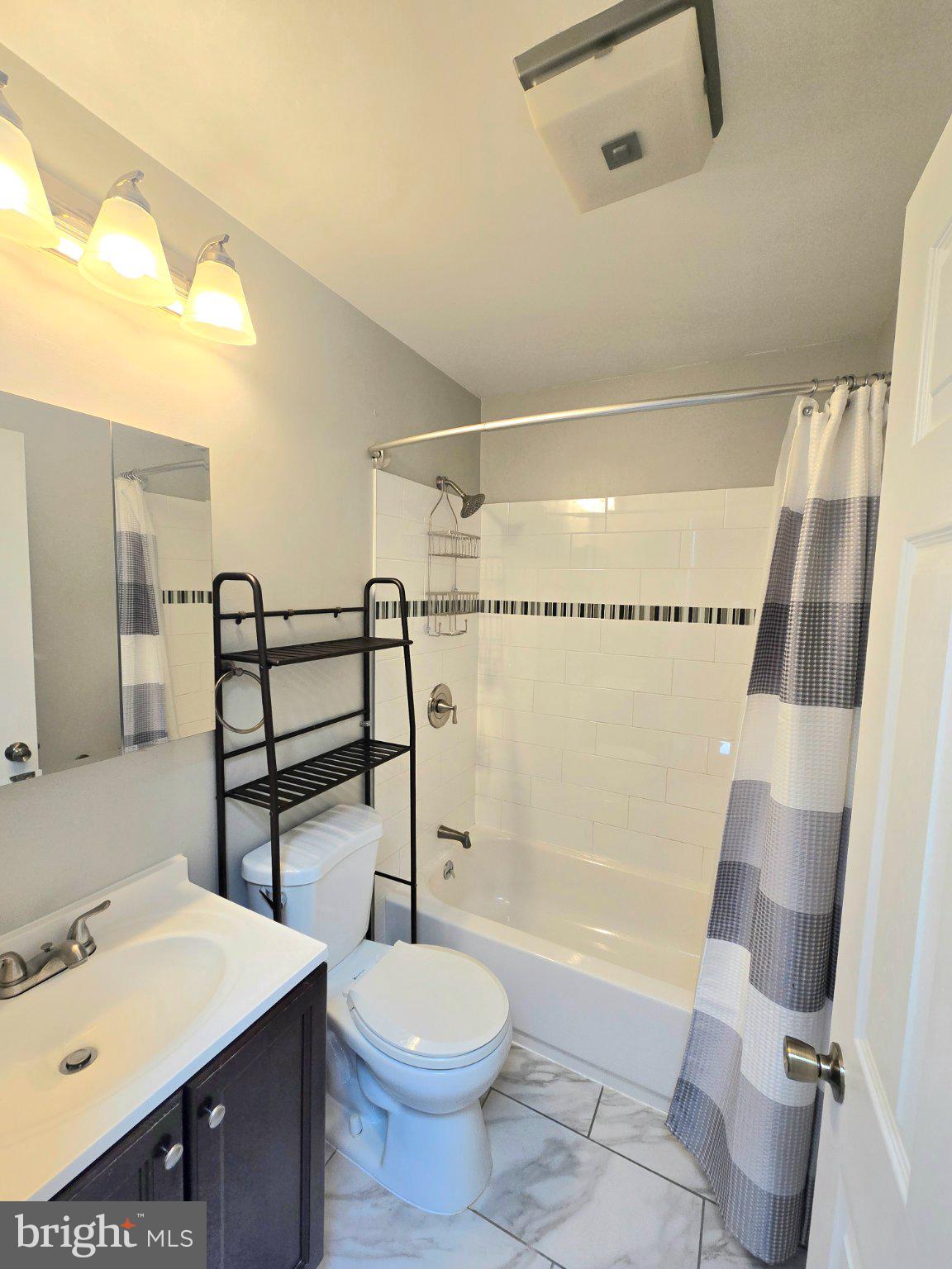 8819 Sonya Road Randallstown, MD 21133 - Photo 10 of 28 Modern bathroom with sleek finishes.