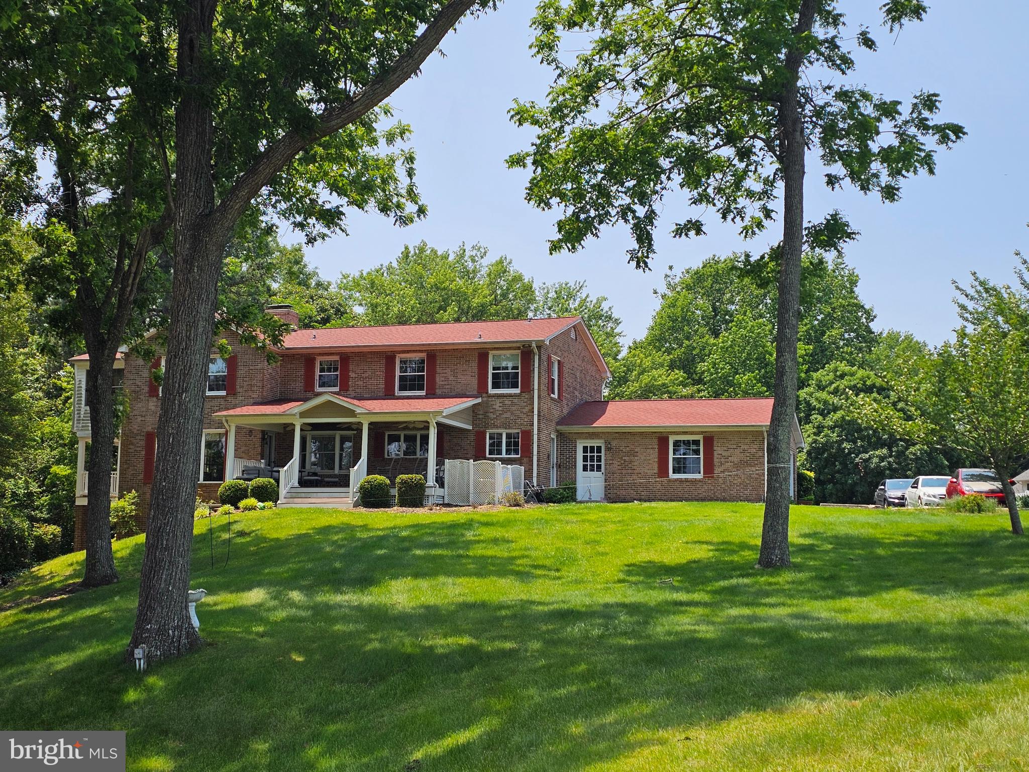 23500 River Road Lexington Park, MD 20653 - Photo 3 of 92 a view of a house with a yard potted plants and large tree