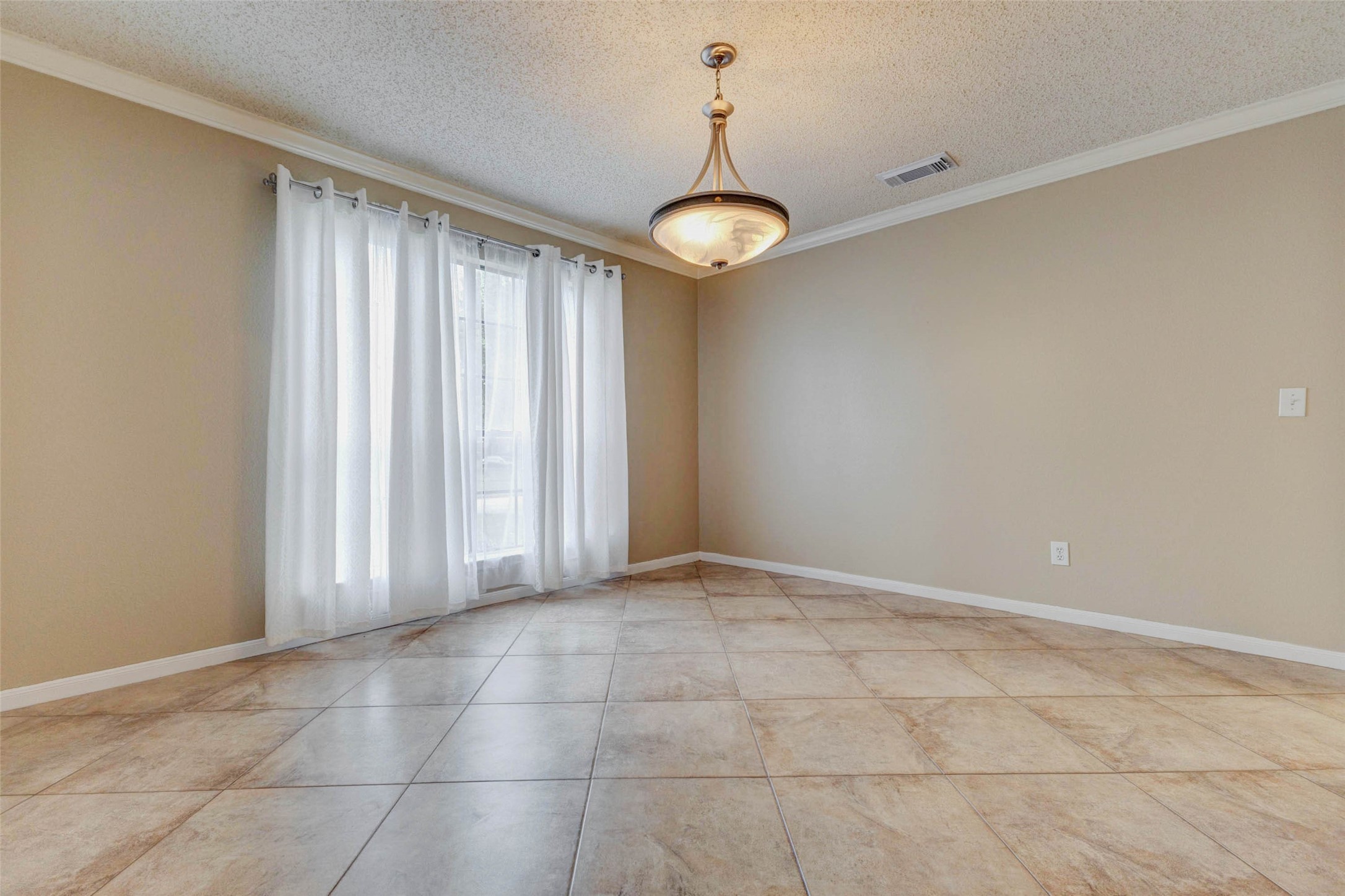 3107 Dulaney Road Houston, TX 77084 - Photo 5 of 50 a view of an empty room with a window