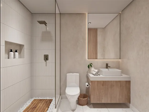 a bathroom with a toilet a sink and shower