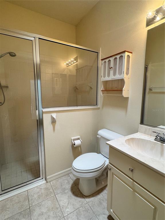 11145 Northwest 17th Court Road Ocala, FL 34475 - Photo 40 of 59 a bathroom with a toilet and a shower