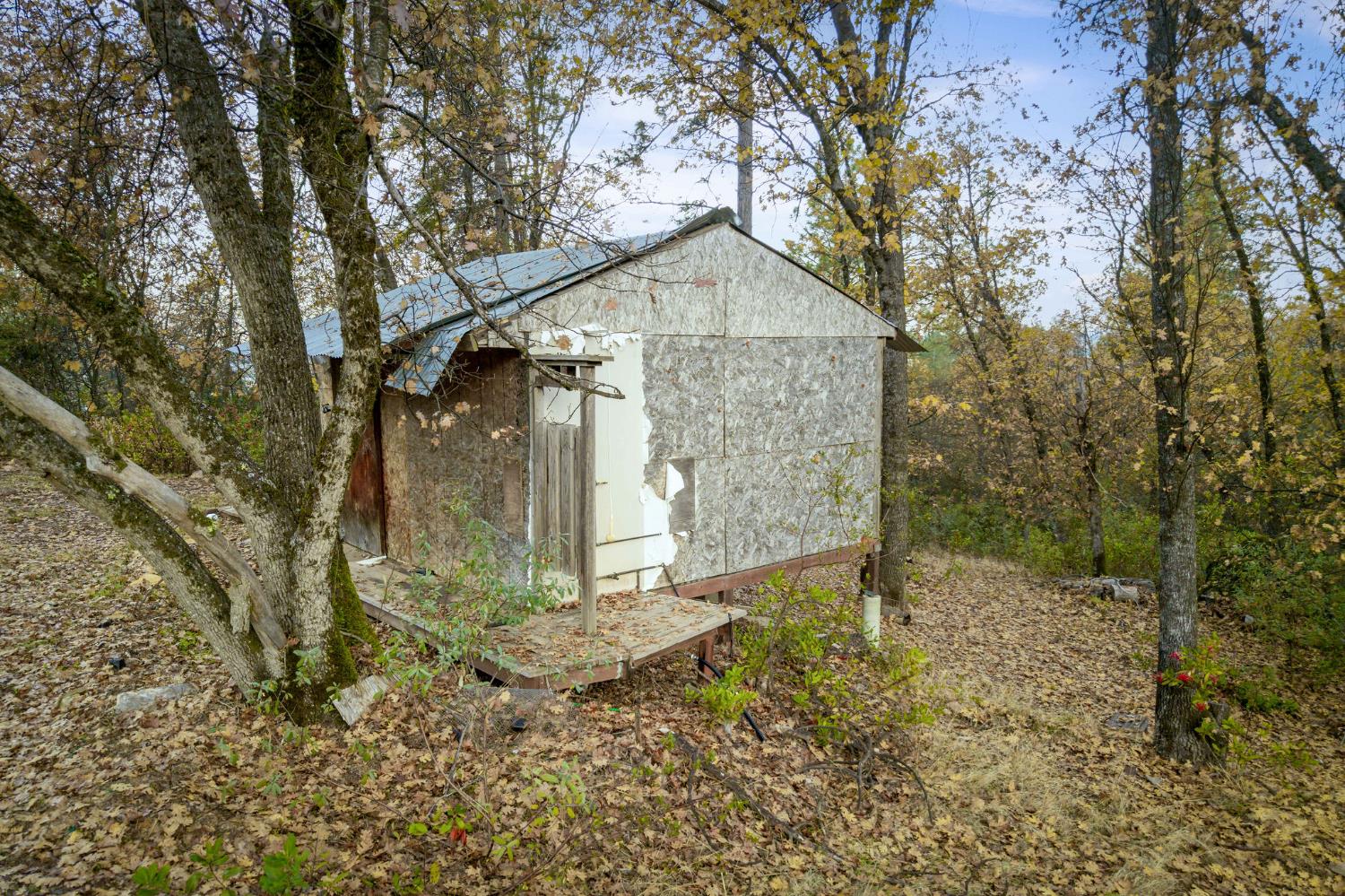 11838 Flying T Road Penn Valley, CA 95946 - Photo 13 of 42 a view of a house with a yard