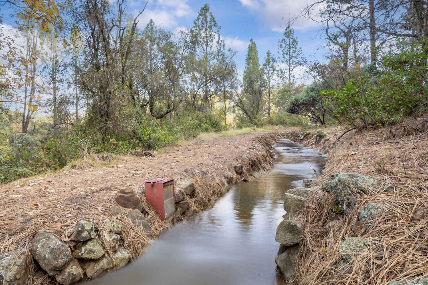 11838 Flying T Road Penn Valley, CA 95946 - Photo 3 of 42 a view of a lake with outside space