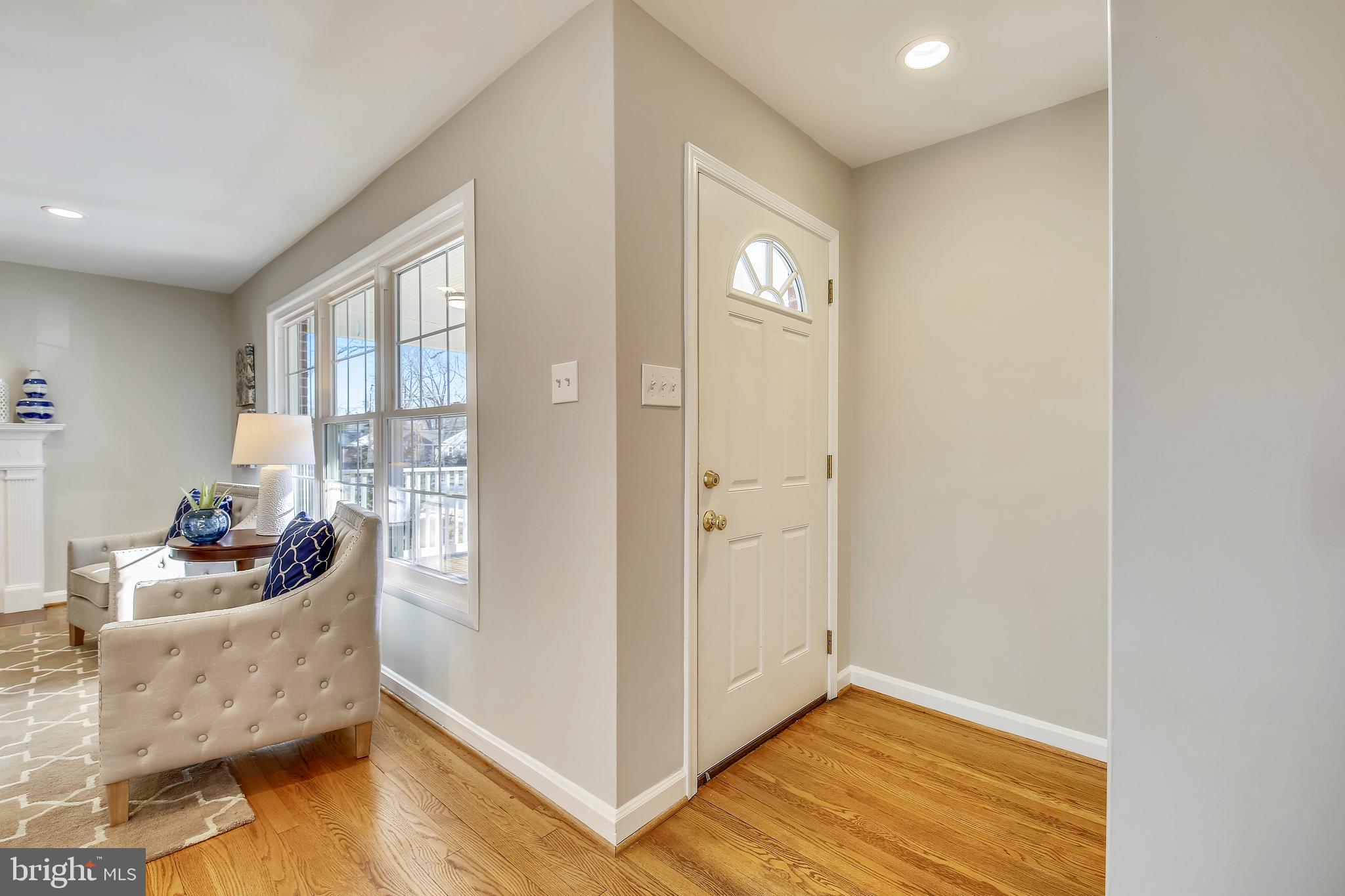 11111 Stillwater Avenue Kensington, MD 20895 - Photo 5 of 47 Foyer entry with hardwood flooring and closet