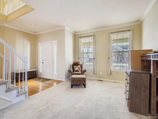a view of workspace with furniture and windows