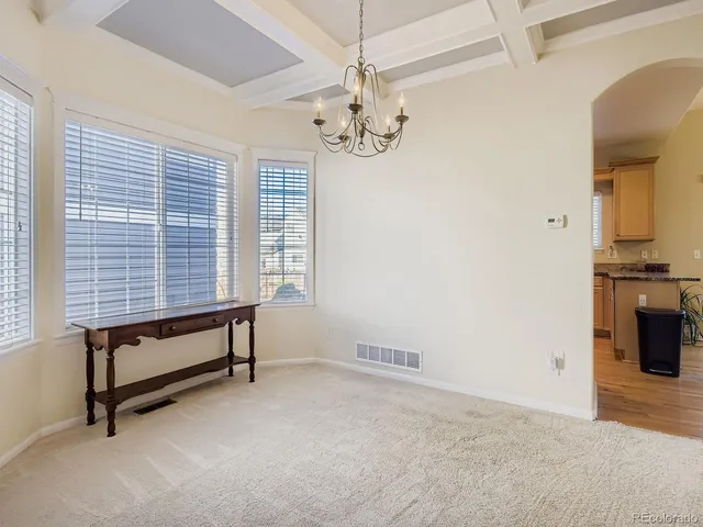 a kitchen with stainless steel appliances a stove sink microwave and cabinets
