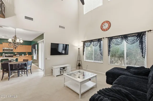 a kitchen with stainless steel appliances granite countertop sink microwave and wooden cabinets