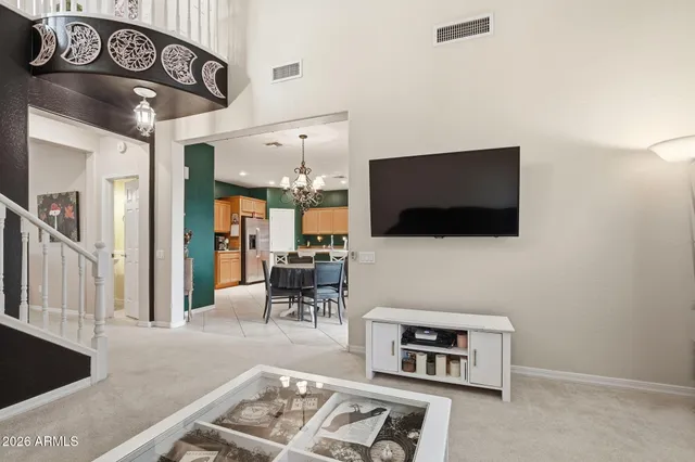a bathroom with a sink mirror and toilet