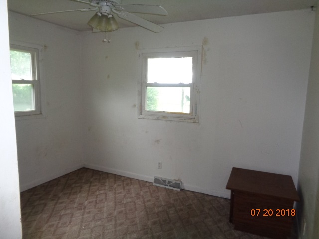403 Scott Road Rochelle, IL 61068 - Photo 8 of 8 an empty room with a window