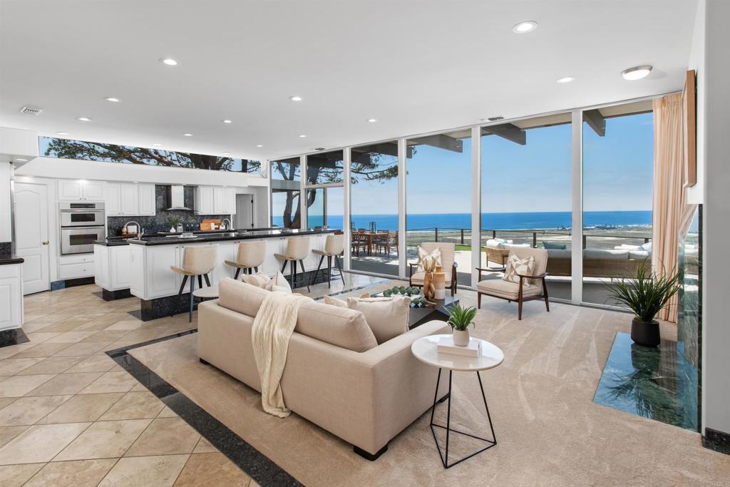 633 Canyon Place Solana Beach, CA 92075 - Photo 20 of 51 a living room with lots of furniture and a table