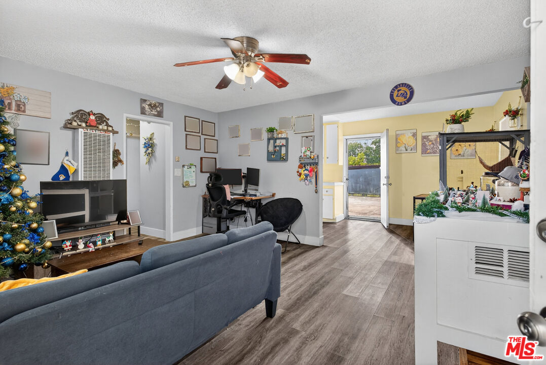 1416 255th Street Harbor City, CA 90710 - Photo 5 of 12 a living room with furniture and a flat screen tv
