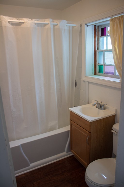 72 Whipple Street Fall River, MA 02721 - Photo 15 of 28 a bathroom with a sink toilet and shower