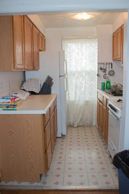 72 Whipple Street Fall River, MA 02721 - Photo 19 of 28 a utility room with cabinets washer and dryer