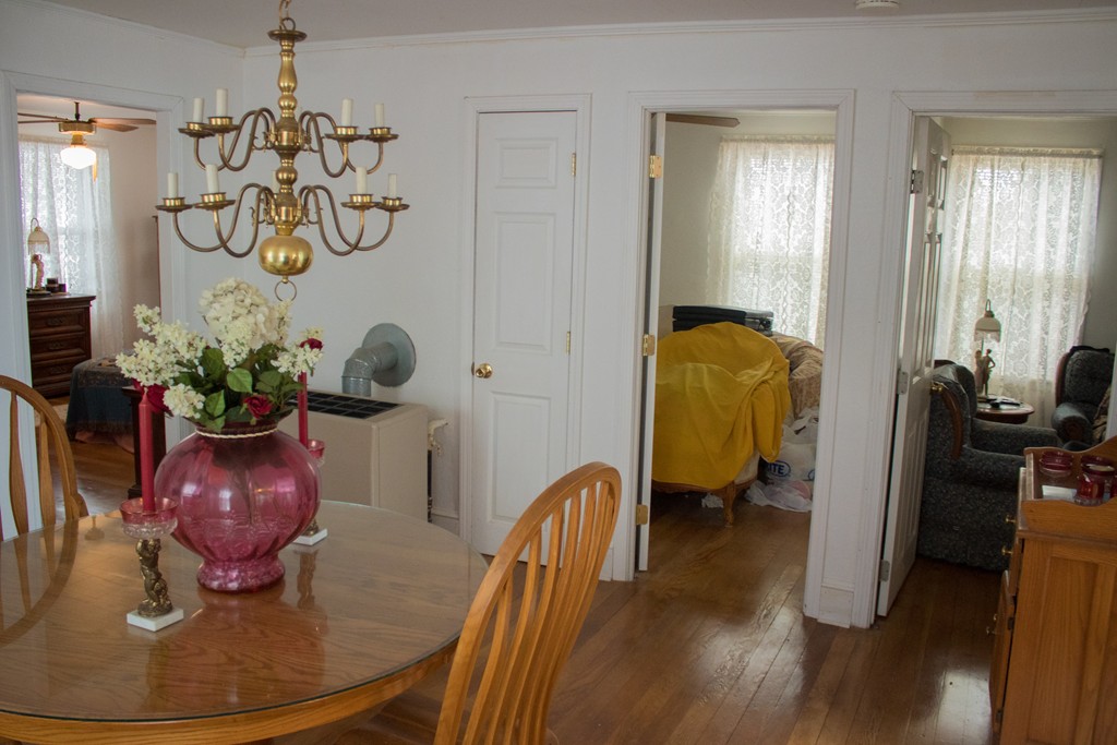 72 Whipple Street Fall River, MA 02721 - Photo 21 of 28 a view of a dining room with furniture and wooden floor