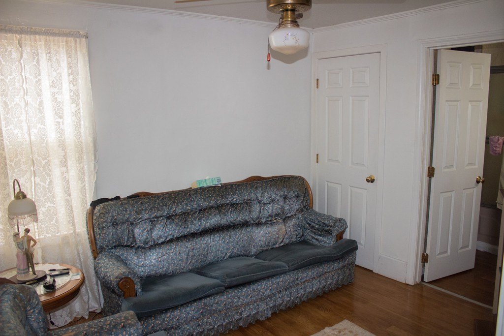72 Whipple Street Fall River, MA 02721 - Photo 23 of 28 a living room with furniture and a window