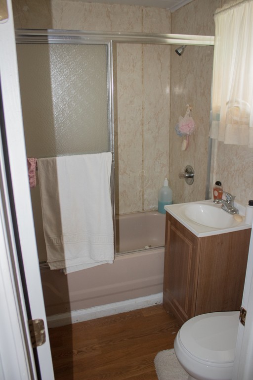 72 Whipple Street Fall River, MA 02721 - Photo 24 of 28 a bathroom with a sink a toilet and shower