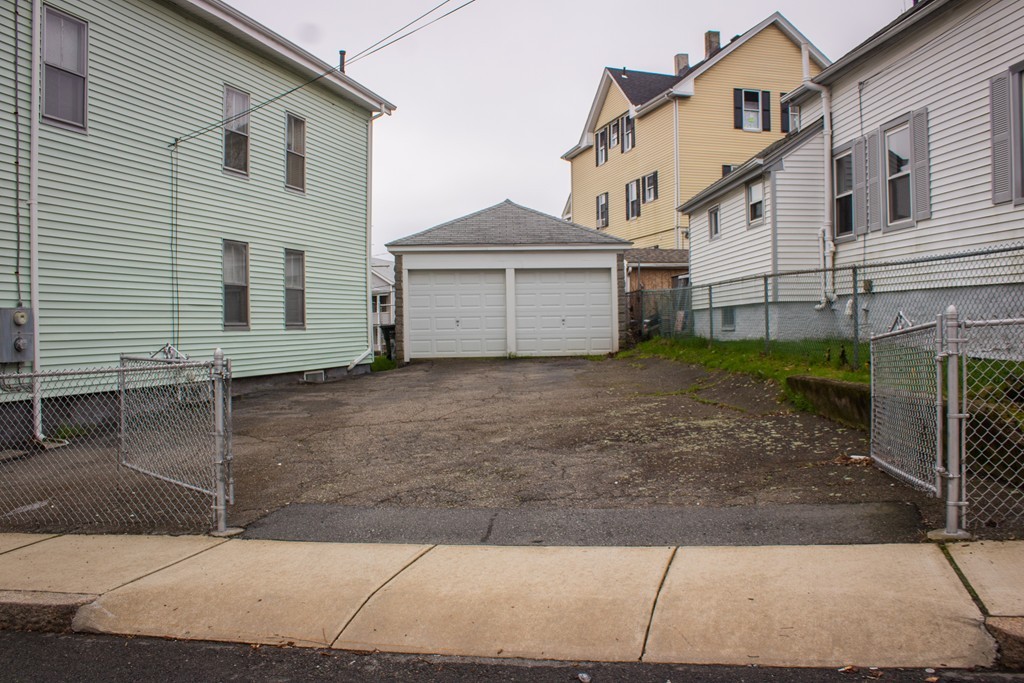 72 Whipple Street Fall River, MA 02721 - Photo 3 of 28 a view of backyard of a house