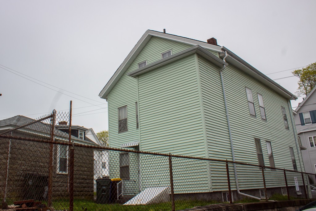 72 Whipple Street Fall River, MA 02721 - Photo 5 of 28 a front view of a house with balcony