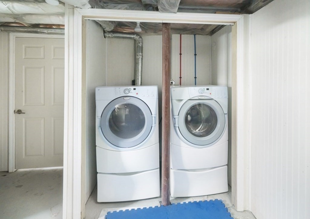33 Bay State Avenue, Unit 1 Somerville, MA 02144 - Photo 17 of 23 a utility room with dryer and washer