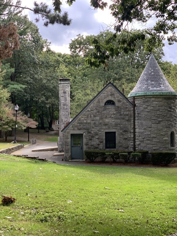 33 Bay State Avenue, Unit 1 Somerville, MA 02144 - Photo 20 of 23 a backyard of a house with lots of green space