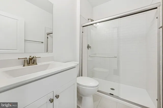 an empty room with closet area