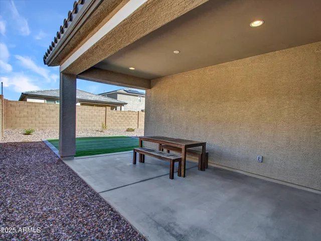 a view of a backyard of the house