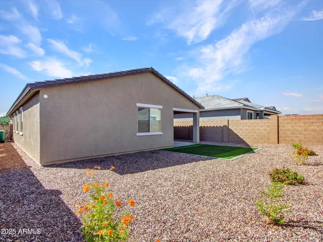 a view of a park with swings and slides