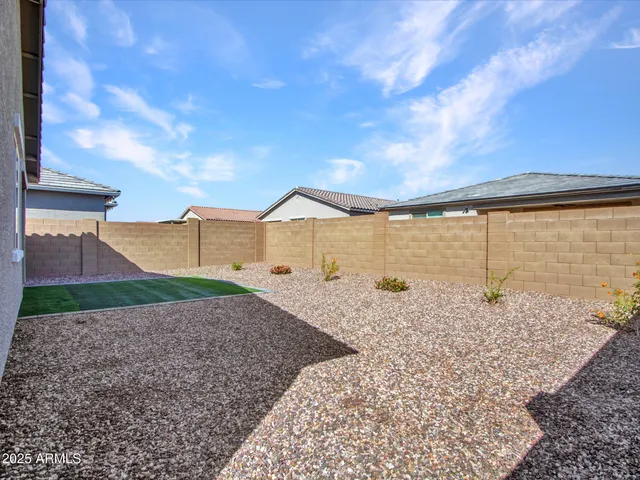 a workspace with furniture window and wooden floor