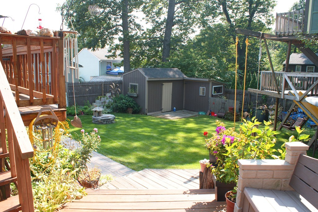 149 Endecott Street Springfield, MA 01118 - Photo 20 of 23 a view of a backyard with a garden
