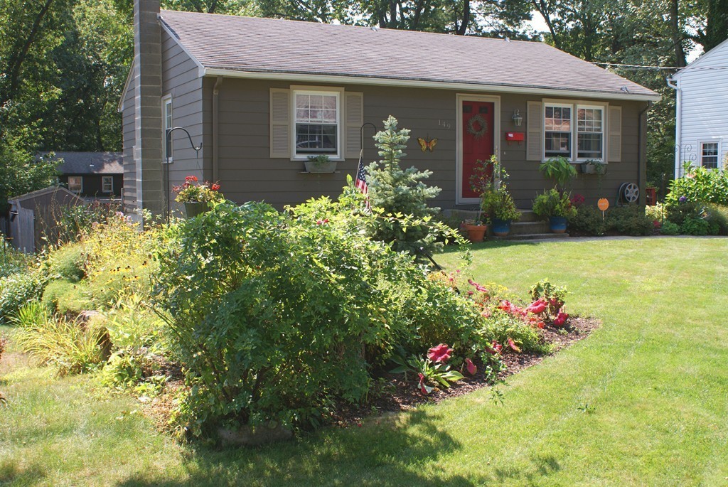 149 Endecott Street Springfield, MA 01118 - Photo 23 of 23 a front view of a house with a yard