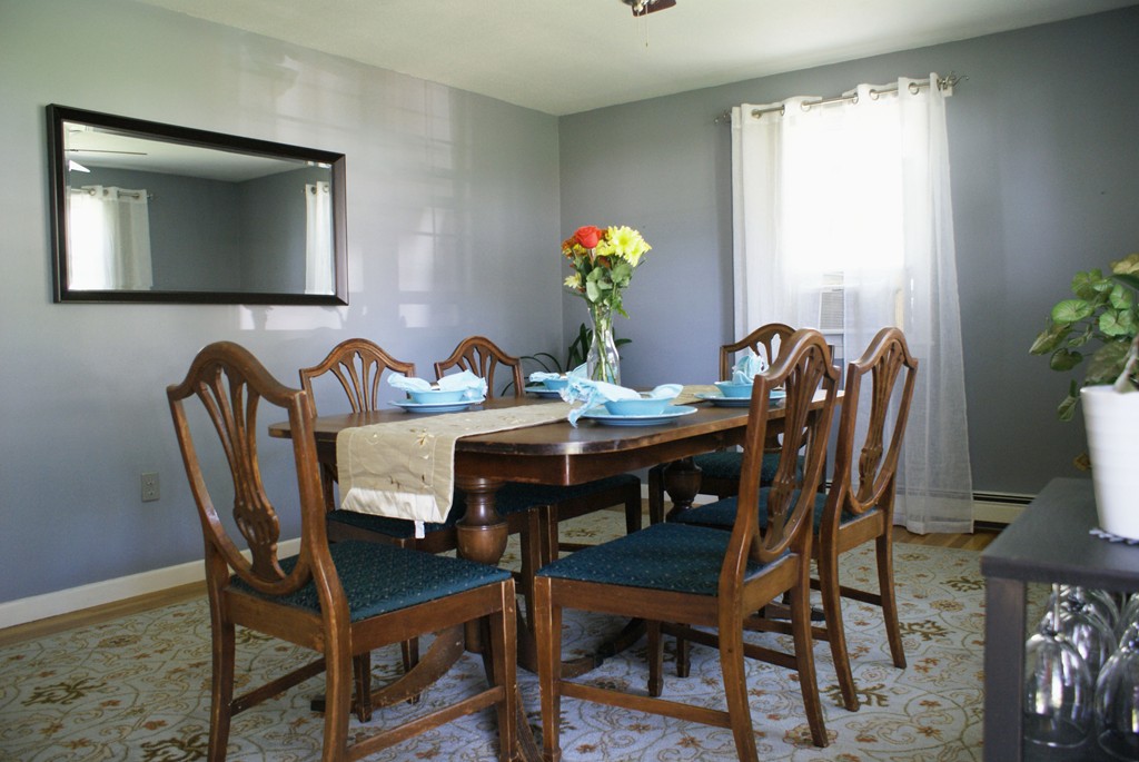 149 Endecott Street Springfield, MA 01118 - Photo 7 of 23 a dining room with furniture and wooden floor